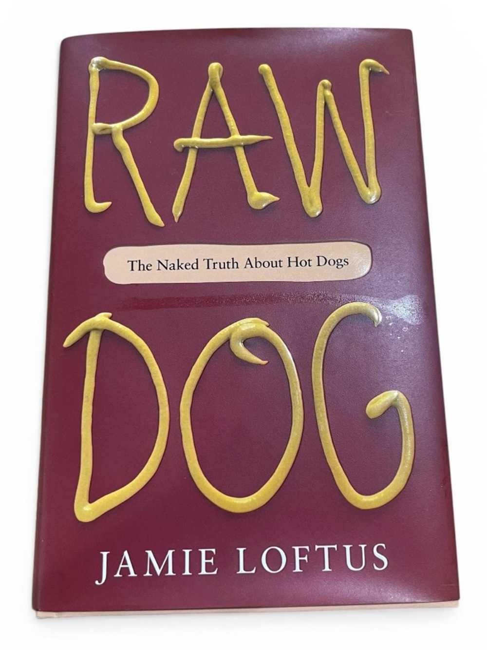 Raw Dog: The Naked Truth About Hot Dogs – Jamie Loftus | Hardcover